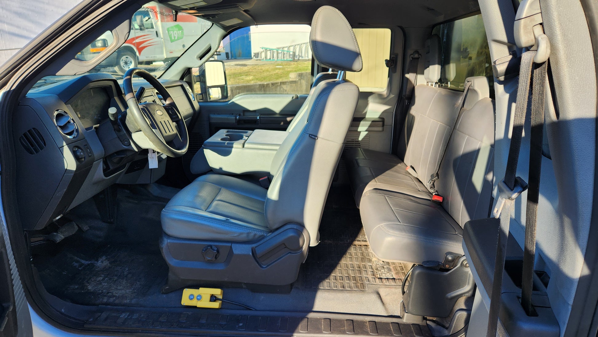 Second image of 2016 Ford F550 4x4 Super Duty Extended Cab & Chassis, 11ft Mason Dump Bed, 102k Miles